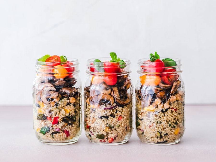food in jars from grocery store, meal prepping with rice and beans and fruits and veggies