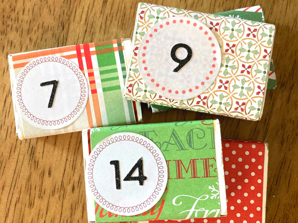 matchboxes wrapped in Christmas decorations